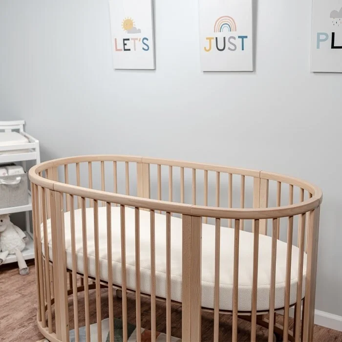 Hybrid mattresses combining foam and innerspring technologyNaturepedic Organic Breathable Oval Crib Mattress (Stokke Sleepi Bed) Hybrid mattresses combining foam and innerspring technologyNaturepedic Organic Breathable Oval Crib Mattress (Stokke Sleepi Bed)