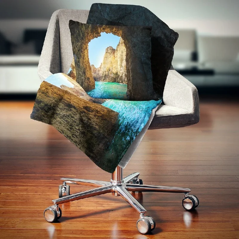 Fleece blankets for a cozy and plush textureDesignart 'Sea through Rocky Cave Portugal' Seashore Throw Blanket Fleece blankets for a cozy and plush textureDesignart 'Sea through Rocky Cave Portugal' Seashore Throw Blanket